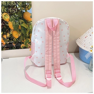 Vue arrière du sac à dos scolaire blanc et rose avec bretelles réglables et motifs étoiles
