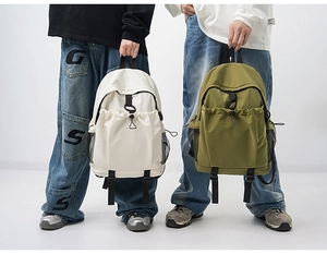 Detail of tear-resistant nylon backpack with drawstring pocket and side mesh storage