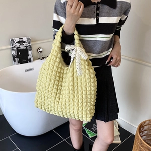 Light yellow popcorn textured tote bag with white lace bow decoration and large capacity