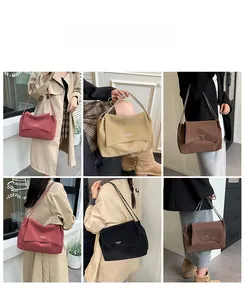 Collage of chic underarm bags in four colors shown with leather chain shoulder straps
