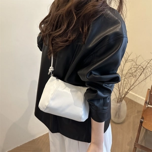 Retro white oversized faux leather dumpling bag for women shown as a stylish shoulder bag