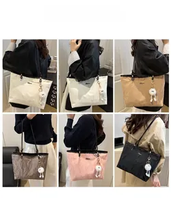 Collage of large nylon tote bags in six colors with stylish pleated texture and plush charms