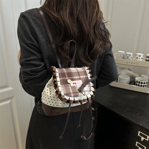 Cute brown plaid backpack for women with lace trim and star pattern on ivory canvas