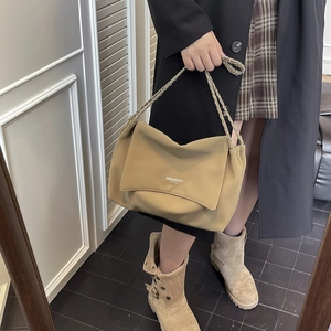 Khaki soft leather shoulder bag with metal chain strap and minimalist design