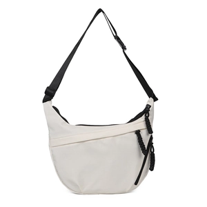 Minimalist beige half-moon crossbody bag with black wide strap and zipper detail