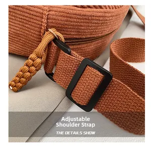 Macro shot of durable caramel knit texture with adjustable black plastic buckle strap