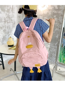 Pink cartoon duck backpack for students featuring 3D animal details and nylon fabric