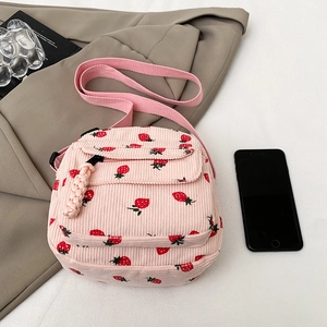 Pink corduroy mini crossbody bag with cute strawberry pattern and front zipper pocket