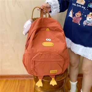 Cute orange duck-themed backpack for students with decorative yellow duck feet and beak