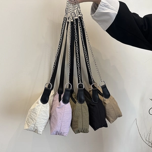 Minimalist nylon underarm bags in multiple colors with silver chain and leather trim