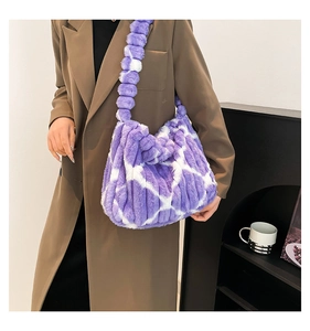 Detail of purple and white checkered plush tote bag with fuzzy faux fur texture