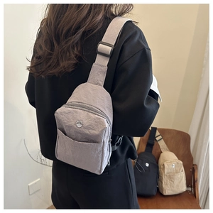 Waterproof nylon chest bag for women showing large capacity and adjustable shoulder strap