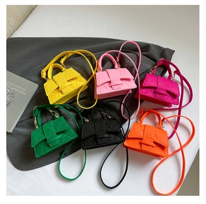 Top view of mini felt handbags in six colors with diamond quilting and thin shoulder straps