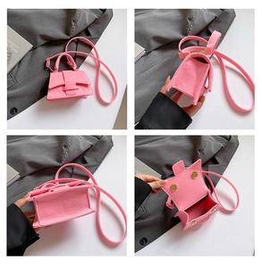 Macro view showing pink quilted felt crossbody bag texture and magnetic clasp detail