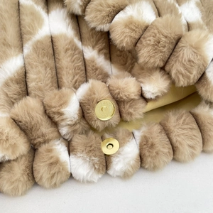 Striped faux fur tote bag featuring a premium gold magnetic clasp and soft texture