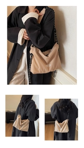 Dettaglio della borsa tote in nylon con spalline in corda intrecciata e logo GAIFYUN