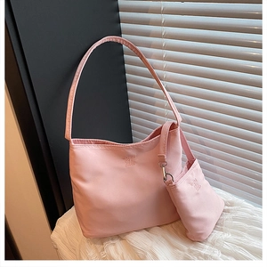 Light pink nylon tote bag set with matching small pouch and enjoy the life embossing
