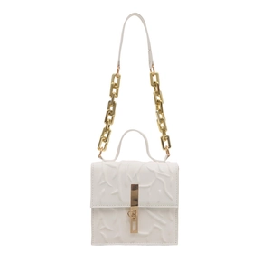 White textured leather crossbody bag with gold chain strap and metallic rectangular buckle