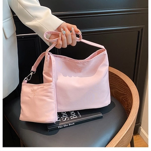 Pink nylon tote bag set with 'Enjoy the Life' embroidery and matching small pouch