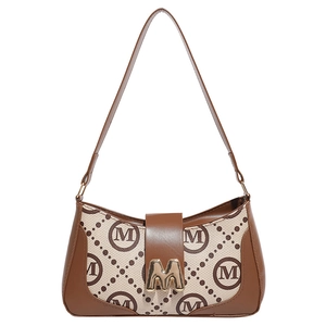 Retro monogram baguette shoulder bag in brown faux leather and beige canvas print