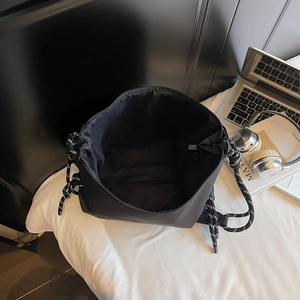 Borsa a secchiello minimalista in nylon nero con coulisse e cerniera per studenti universitari