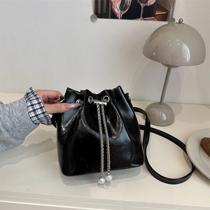 Glossy PU Leather Bucket Bag For Women Fashionable Crossbody Purse With Metal Chain Drawstring And Artificial Pearl Pendants