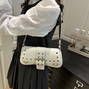 White faux leather shoulder bag with punk silver studs and a classic buckle accent