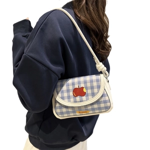 Blue and white plaid crossbody bag with red apple embroidery and knotted strap