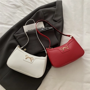 Fashionable bow-knot baguette shoulder bags in white and red with lychee leather texture