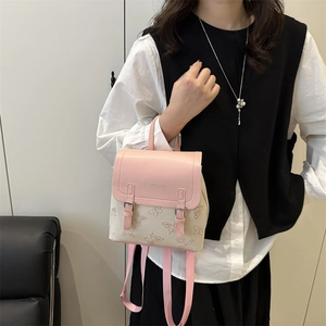 Chic pink and beige floral mini backpack with butterfly patterns for stylish women