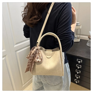 Chic beige PU leather crossbody bag with brown plaid silk scarf and rounded handle