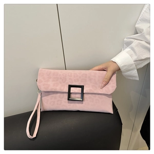 Pink suede clutch bag with leopard print texture and elegant black square buckle detail