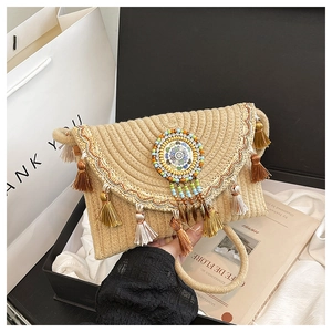 Detailed straw envelope bag with colorful bead embroidery and tassel fringe decor
