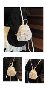 Three lifestyle views of a cream mini bow backpack on dark wooden stairs background