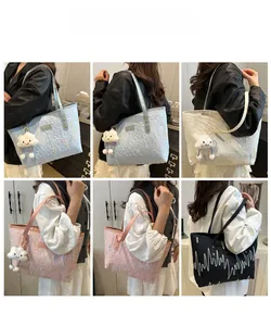 Multiple views of large capacity tote bag in blue, white, pink, and black with cloud charm