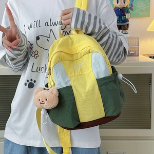 Three-color contrast nylon backpack with cute bear pendant and embroidery detailing