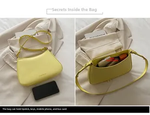 Detailansicht des geräumigen Innenraums und der gelben Halbmond-Tasche mit FASHION-Schriftzug