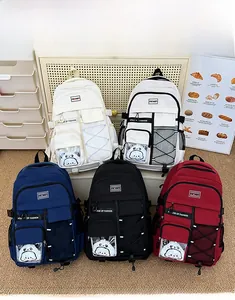 Détail de sacs à dos ergonomiques multicolores à grande capacité pour lycéens et étudiants