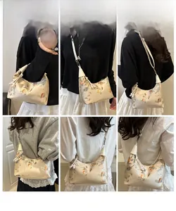 Detail view of ethnic embroidery on large hobo bag shown in multiple outfits