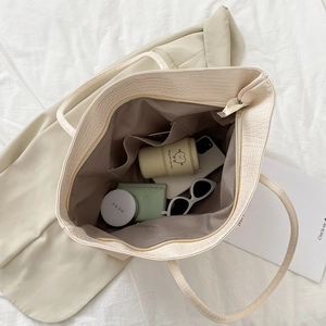 Crocodile pattern large tote bag in creamy beige with spacious interior for daily essentials