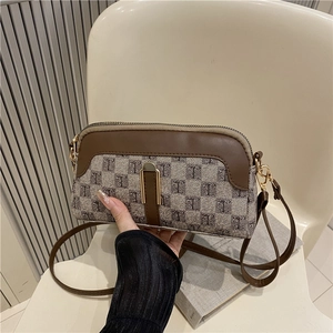 Sac à bandoulière marron classique avec motif monogramme vintage et cuir