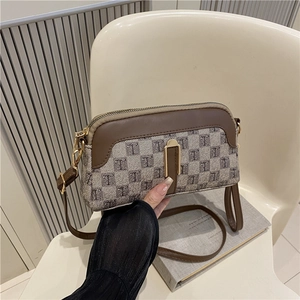 Sac bandoulière rétro forme coquille avec motif jacquard en T et finitions dorées
