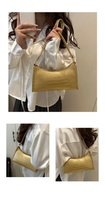 Detailed views of gold crocodile embossed baguette bag showing shoulder and hand-carry style