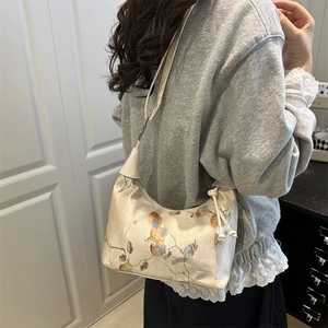 New Chinese style embroidered half-moon shoulder bag in beige satin with flower and bird motifs