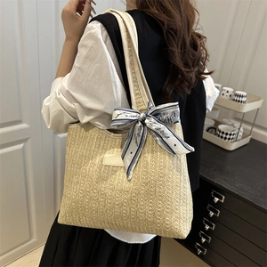 Handwoven beige straw bucket tote bag with floral Paris silk scarf and leather accent