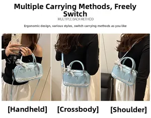 Three ways to carry the light blue ballet-style Boston bag: handbag, crossbody, and shoulder