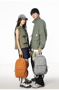 Dual view of orange-brown and light gray nylon backpacks for daily commuting and travel