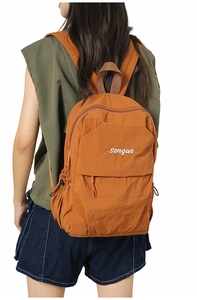 Detailed back view of the orange nylon backpack with songuo logo and drawstring pockets