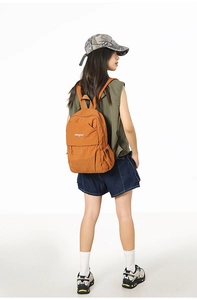 Burnt orange nylon backpack with songuo logo and drawstring pockets in outdoor style