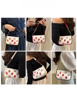 Collage showing various strawberry print shoulder bags styled on models from multiple angles